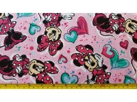 Minnie Mouse with hearts on pink background