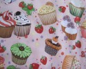 Cupcakes and Strawberries on a Pink Background